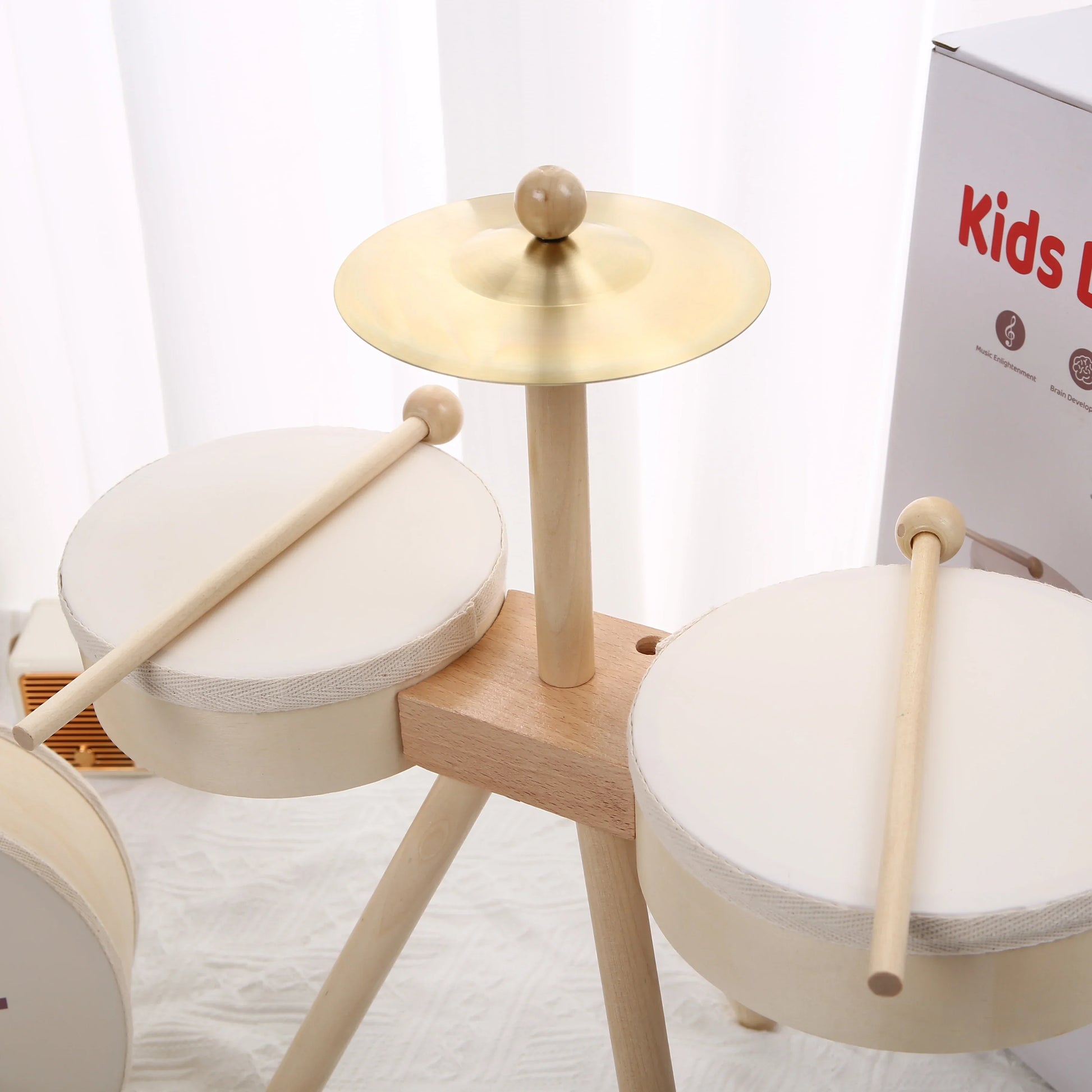 Wooden kids drum set with cream padded drums golden cymbal and light wood sticks educational percussion toy