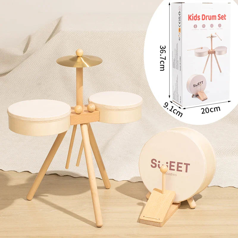 Beige wooden kids drum set with gold cymbal and white drumheads by sweet for music toys educational and percussion play