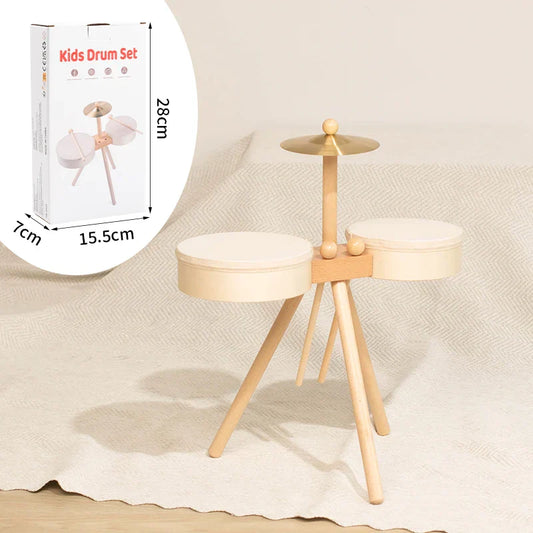 Wooden kids drum set with light natural wood frame and cream padded drums is an educational percussion toy