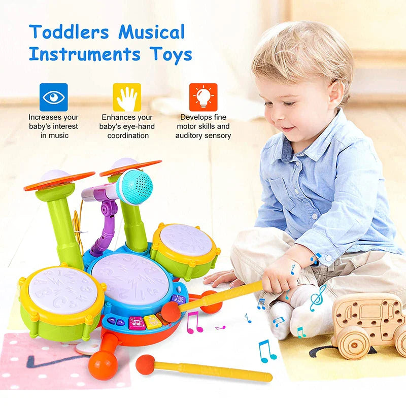 Brightly colored kids drum set with green, blue, orange drums, purple microphone, and yellow mallets for musical baby educational microphone learning activities