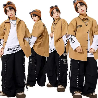 Tan oversized button-up shirt with white sleeves and black text for kids hiphop dance style y2k streetwear accessories