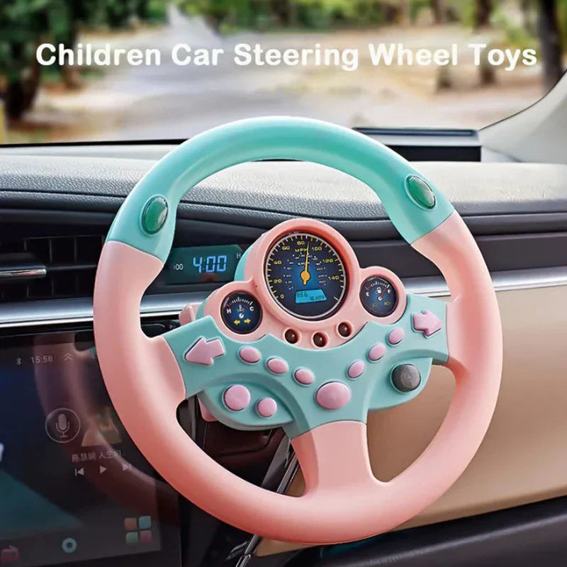 Pastel pink and mint green kids steering wheel toy with digital display and buttons for backseat pretend play driving simulator gift