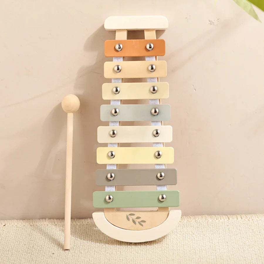 Pastel-colored kids wooden montessori xylophone with soft rounded keys and silver tuning pins for preschool music play