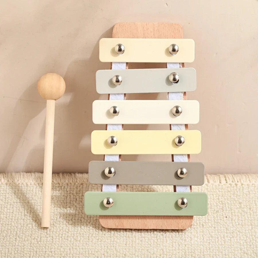 Pastel-colored kids wooden montessori xylophone with silver tuning pegs for squirrel percussion instruments play