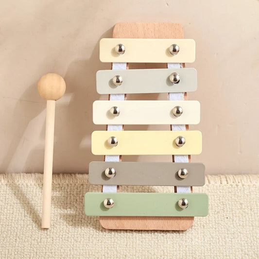 Pastel-colored kids wooden montessori xylophone with silver tuning pegs for squirrel percussion instruments play