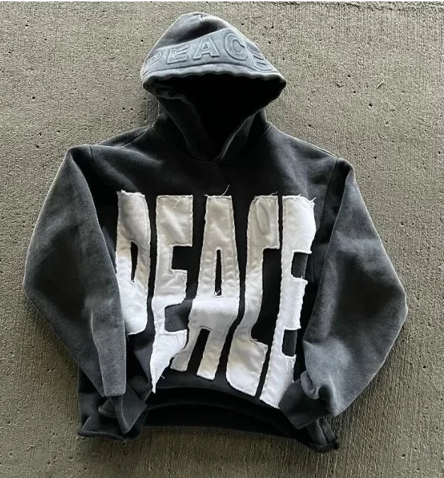 Black minimalist sweatshirt in korean fashion retro style featuring a distressed peace patch and embroidered hood lettering