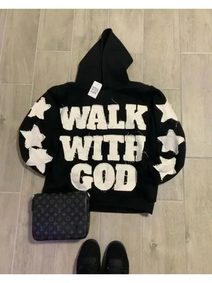 Black minimalist sweatshirt in korean fashion retro style featuring white walk with god lettering and star patches on sleeves