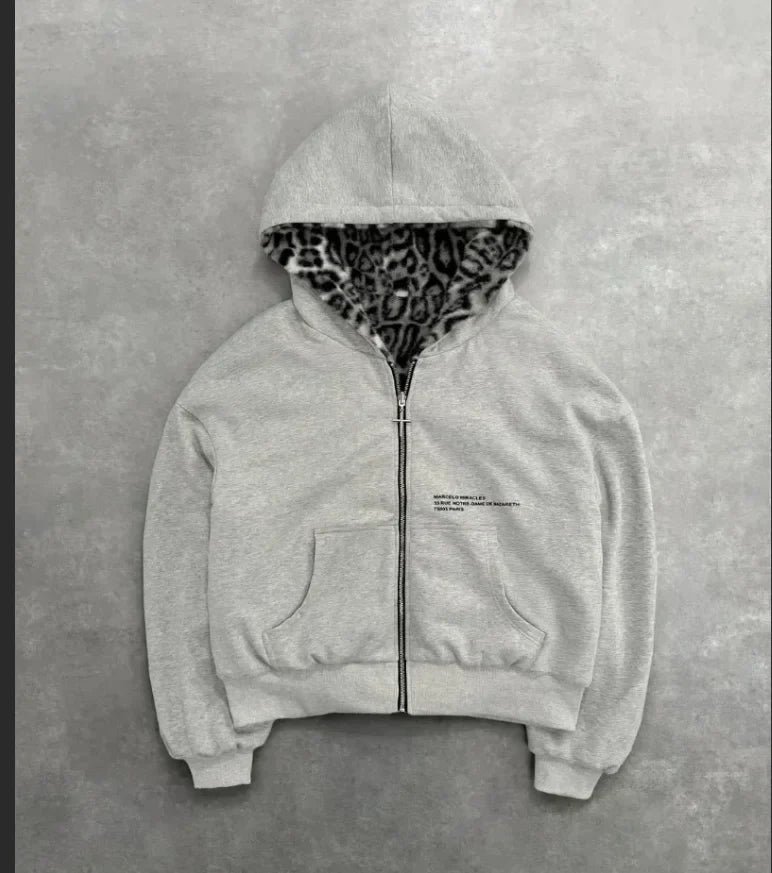 A light gray zip-up hoodie with leopard-print fleece lining and subtle chest text in korean fashion retro style