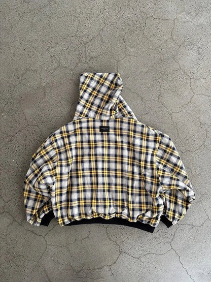 A cropped puffy sleeved hooded black minimalist sweatshirt in yellow plaid with black hem for gothic couple street wear
