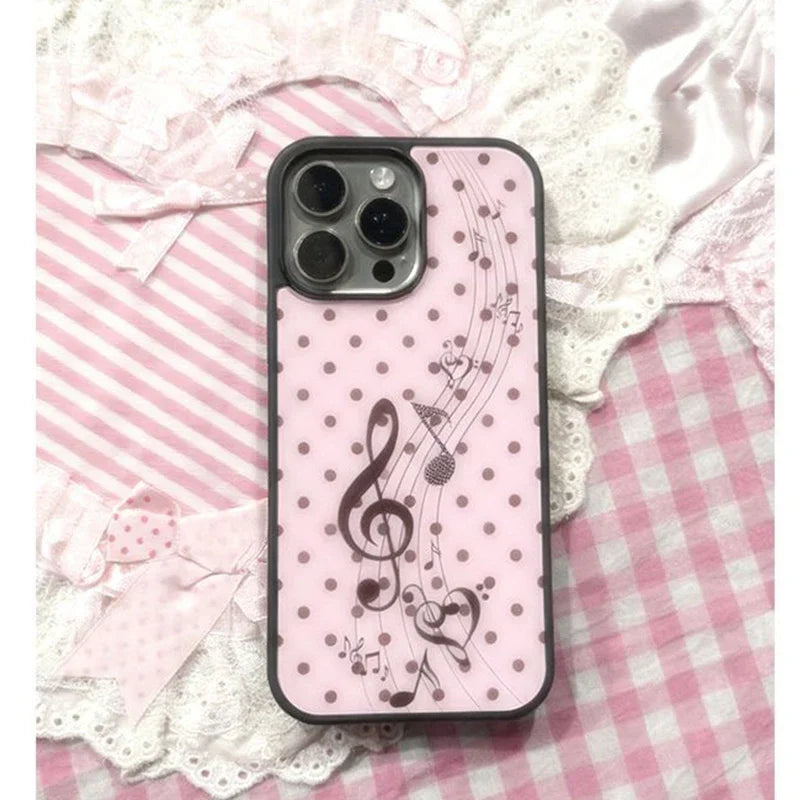 Back side of a korean ins pink plus y2k cover phone case with black polka dots and dot girl heart music note design