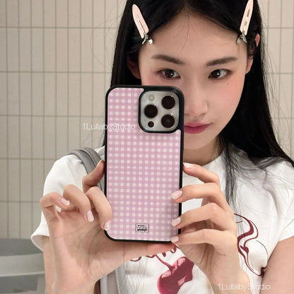 Back view of a korean ins pink gingham plus y2k cover phone case with black border and dot girl heart logo for iphone models