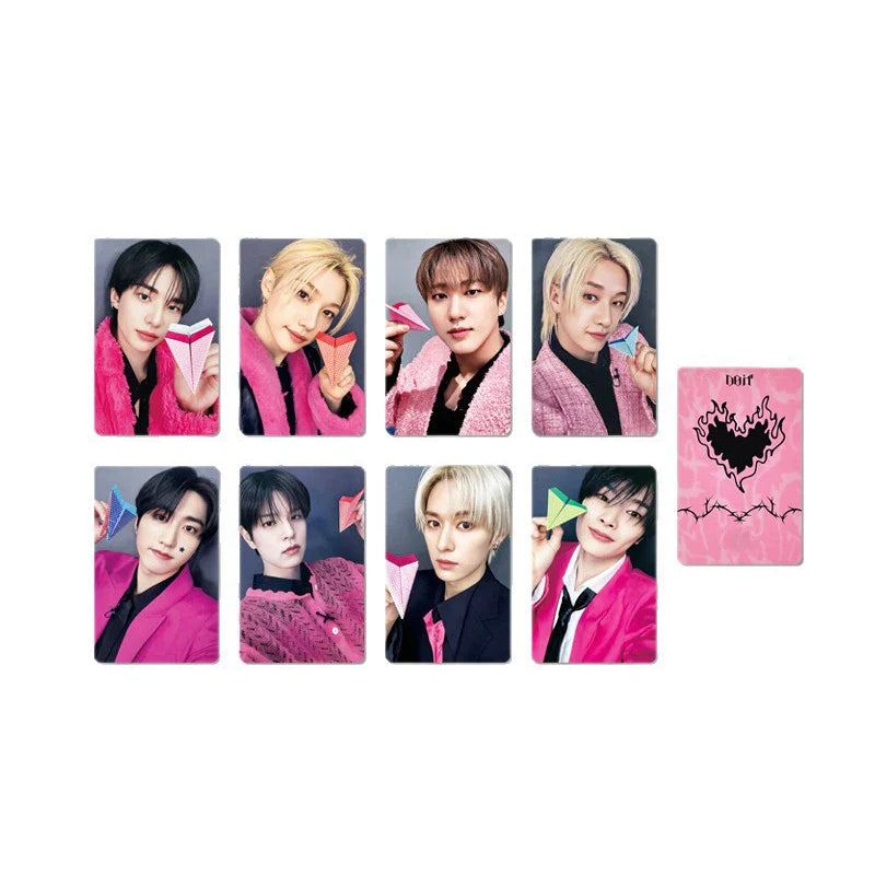Pink photocard from kpop idol do it pop-up merch featuring a black flame heart design and the word doir at the top