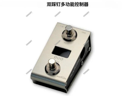 Silver metallic kpp hotone dsp pedal with two footswitches and small display screen neural compatible midi captain controller professional