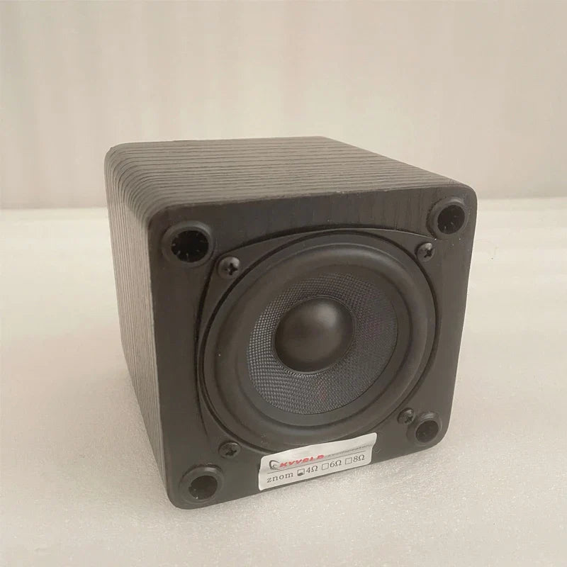Black zynom 3 inch passive bookshelf speaker with textured wooden enclosure and circular grille for computer audio loudspeaker
