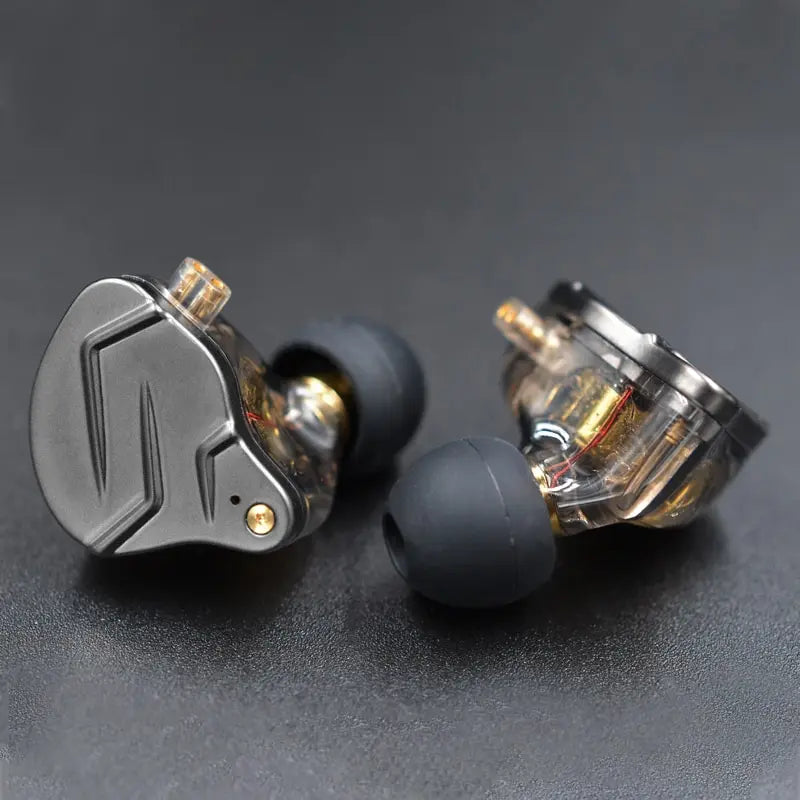 Silver and transparent in-ear style kz zsn pro earphones with gold accents featuring hybrid technology and volume control