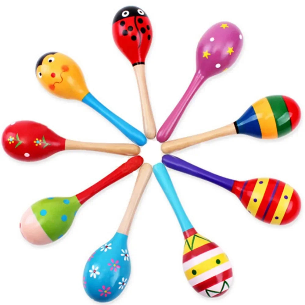 A large montessori baby toy wooden colorful instrument rattle shaker featuring hand-painted playful designs