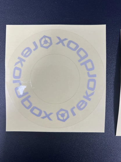 A circular translucent protective film cdj sticker with light purple xobox text for large turntable at beat music store