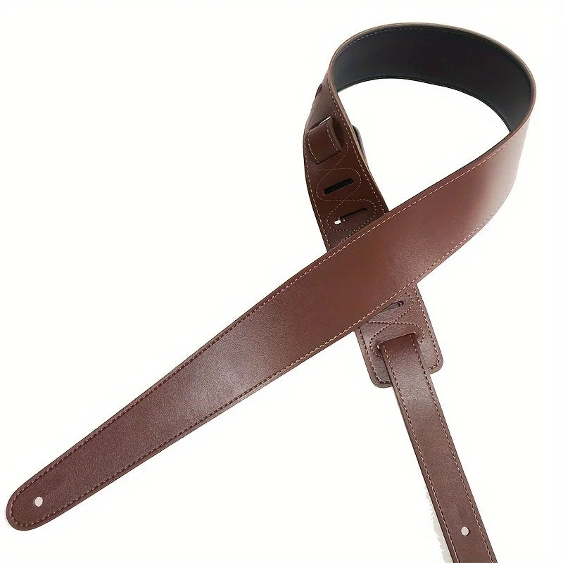 Brown leather guitar strap with stitched edges and black inner lining adjustable for electric acoustic bass guitars