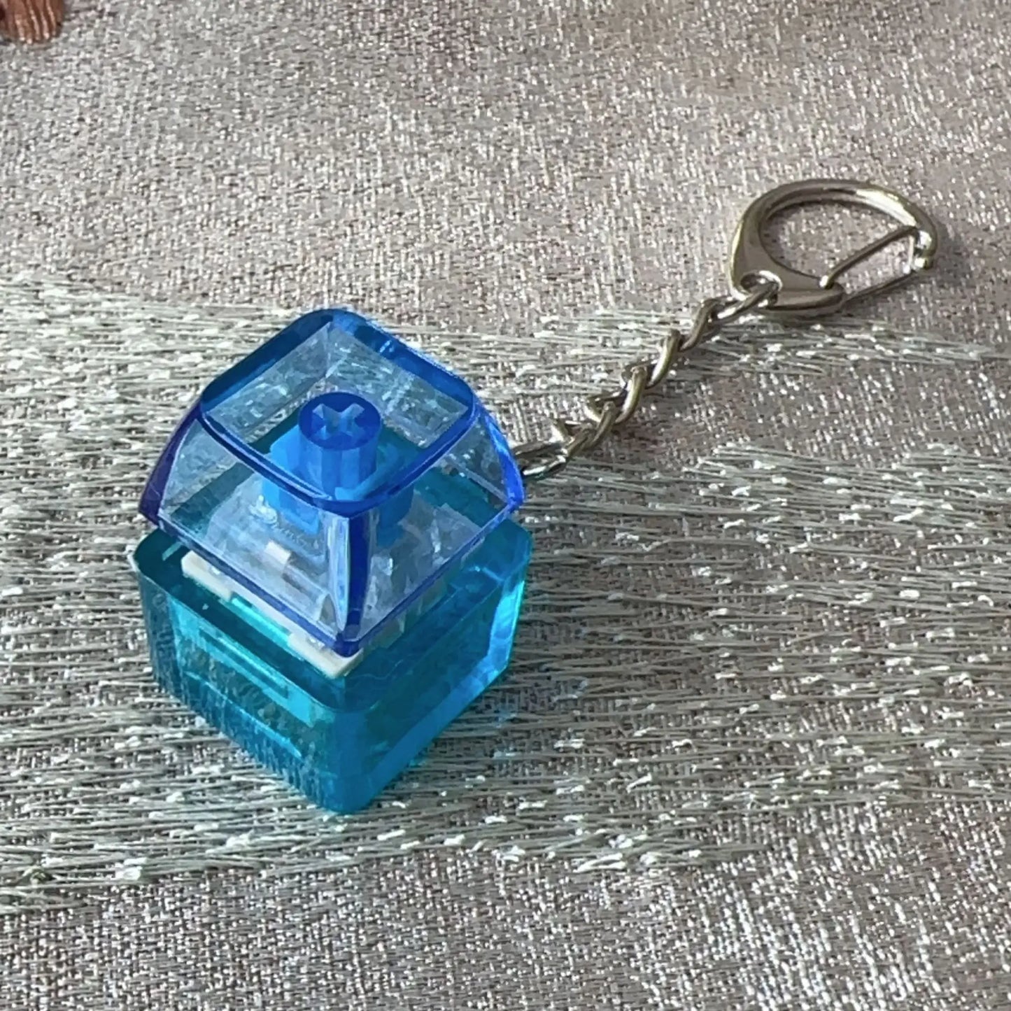 Blue translucent plastic keyboard key chain shaped like a mechanical switch for chain toy stress relief diy button use