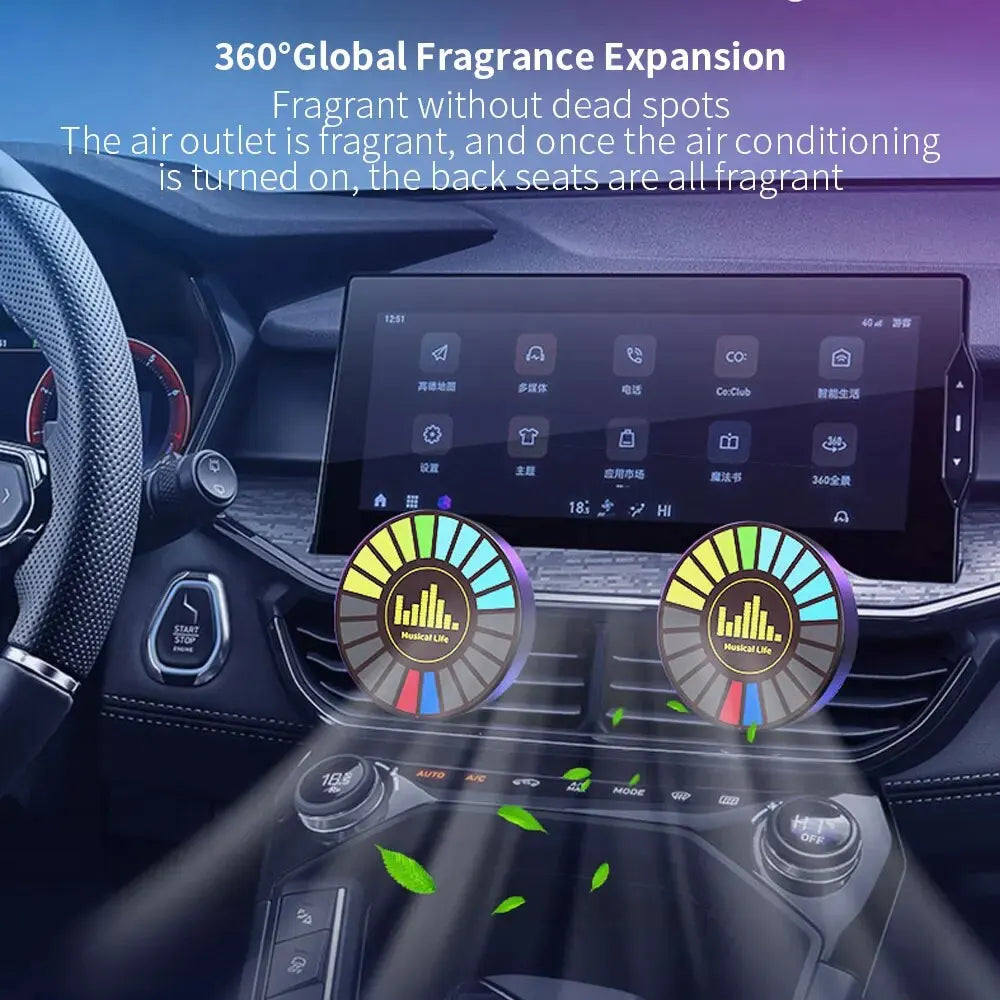 Two circular multi-colored fragrance diffusers with music sound control logo mounted in car vents for car ambient light