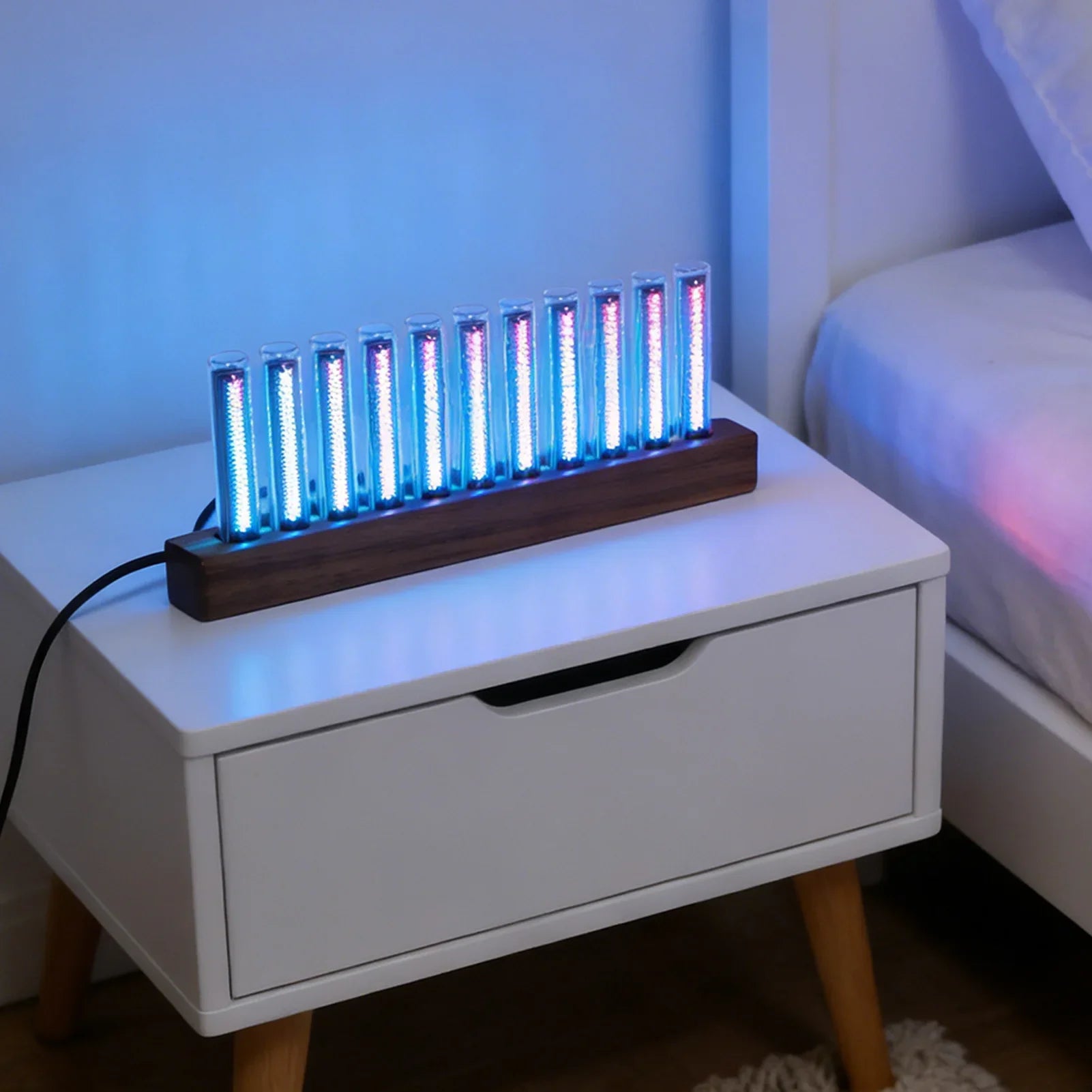 Blue-lit nixie tube clock with dark wood base featuring led music spectrum display and adjustable color light tubes