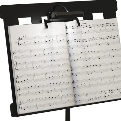 Black metal music stand with rechargeable clip LED music stand light featuring stepless dimming holding piano sheet music