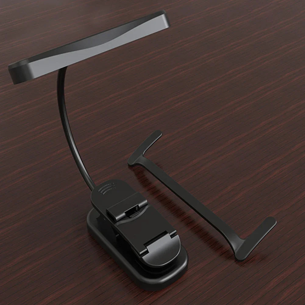 Black rechargeable clip-on music stand light with sleek curved arm matte finish and stepless dimming feature