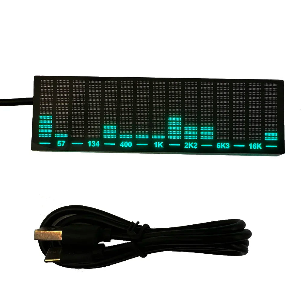 Black rectangular led music spectrum display with glowing teal bars and usb cable for ambient light atmospheric use