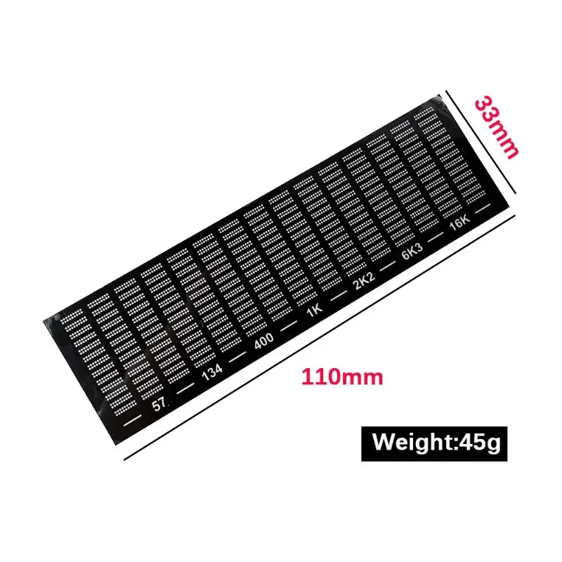 Black rectangular solder mask with white numerical markings and grid lines for music spectrum display pickup ambient light atmospheric use