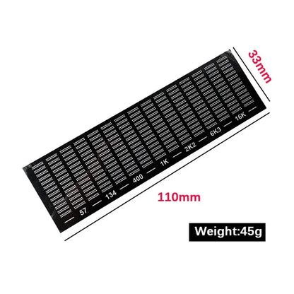 Black rectangular solder mask with white numerical markings and grid lines for music spectrum display pickup ambient light atmospheric use