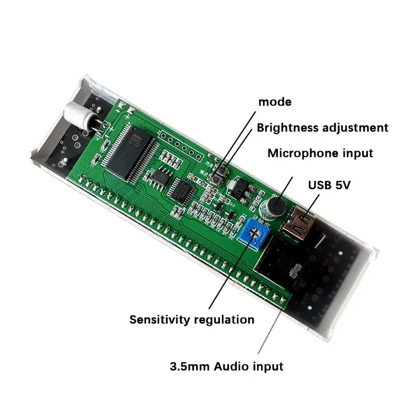 Green circuit board with labeled ports including usb 5v input for led sound controlled music spectrum display ambient light atmospheric