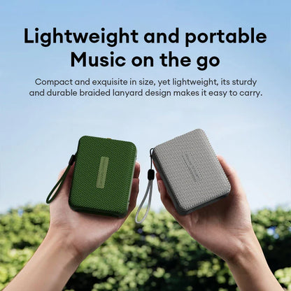 Lenovo hd108 wireless speaker in green and gray textured design with braided lanyards 360° surround sound tf card playback music player