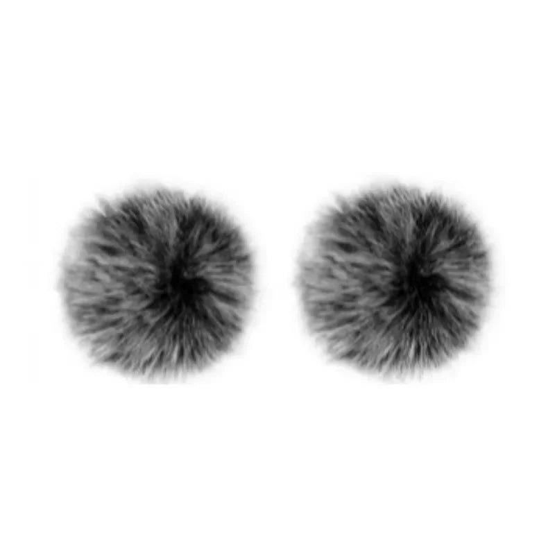 A pair of fluffy gray pom-poms with soft fur texture for lenovo k11 professional wireless lavalier microphone recording interview use