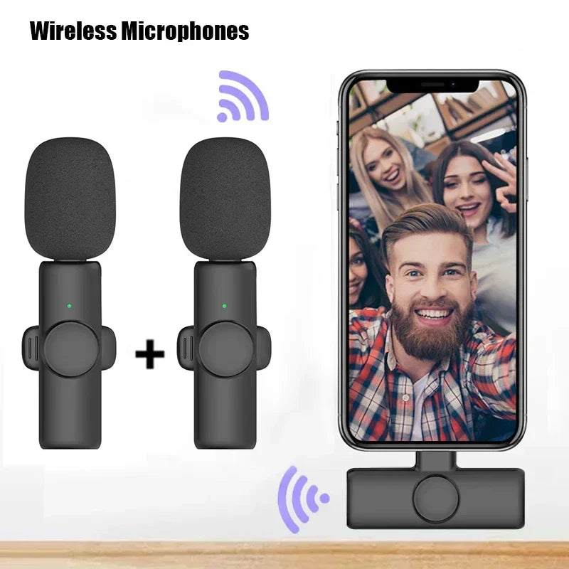 Black professional wireless lavalier microphones with foam windshields and receiver base for microphone recording interview use