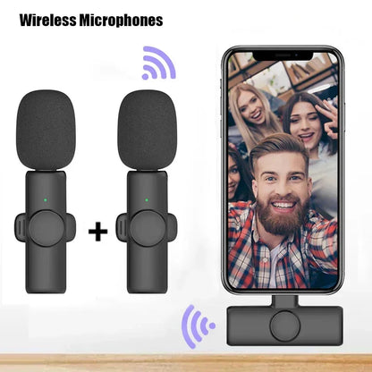 Black professional wireless lavalier microphones with foam windshields and receiver base for microphone recording interview use