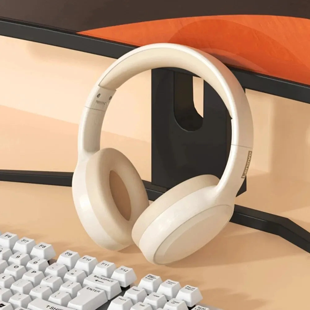 Cream-colored Lenovo TH30 wireless earphones foldable gaming headset with soft padding and mic music earbuds for sport use