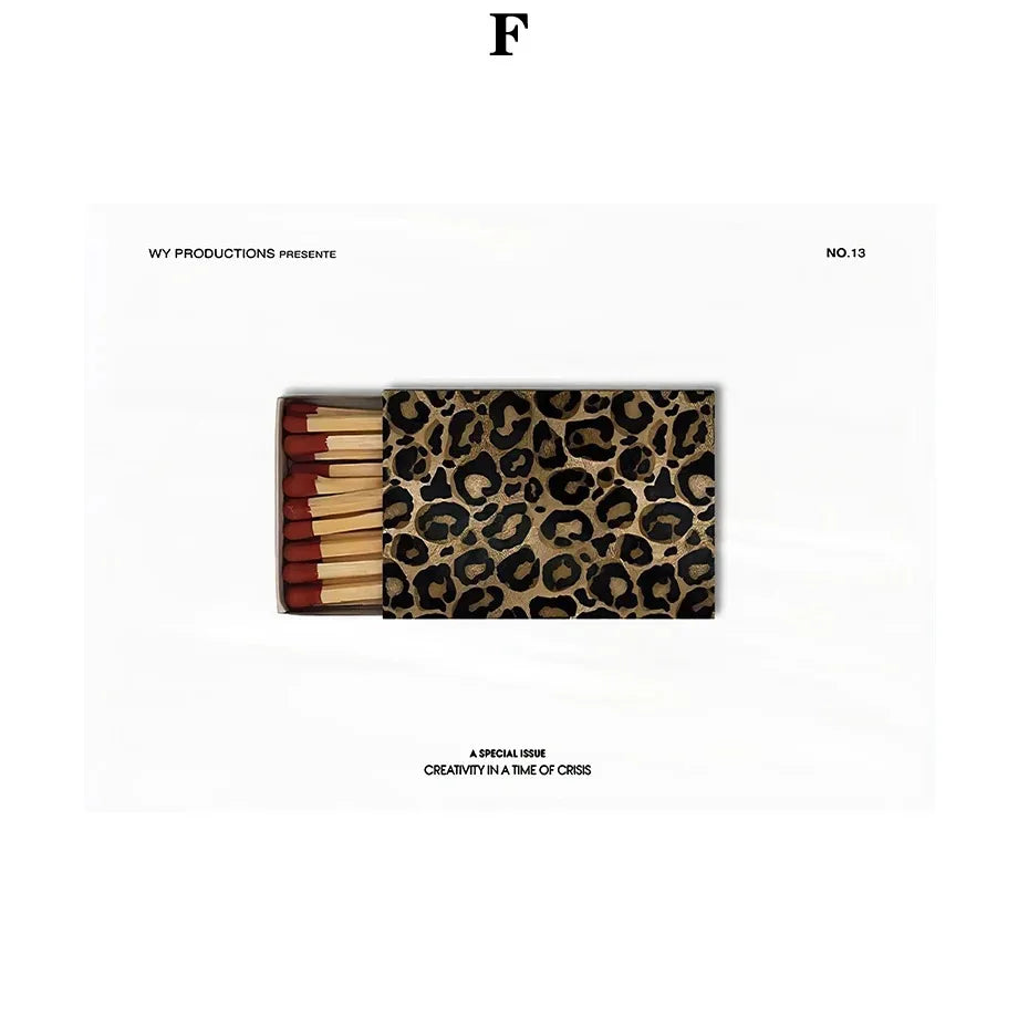 Leopard-print matchbox with red-tipped wooden matches featured in leopard rose fashion wall art canvas painting