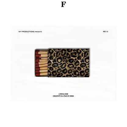 Leopard-print matchbox with red-tipped wooden matches featured in leopard rose fashion wall art canvas painting