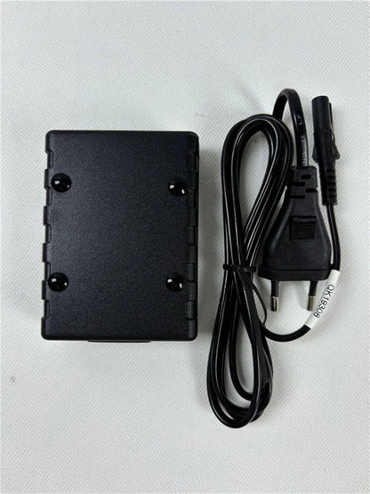 Black plastic power adapter with coiled cable and european plug for lhy new oled display mains noise tester emi meter