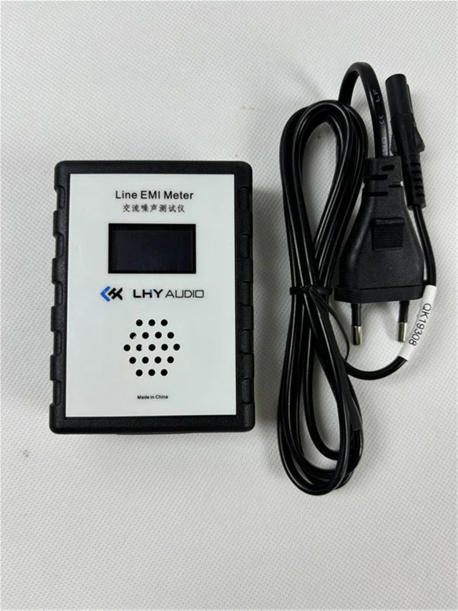 Black and white line emi meter with digital oled display, perforated speaker grille, and lhyaudio branding mains noise tester and emi measuring instrument broadband