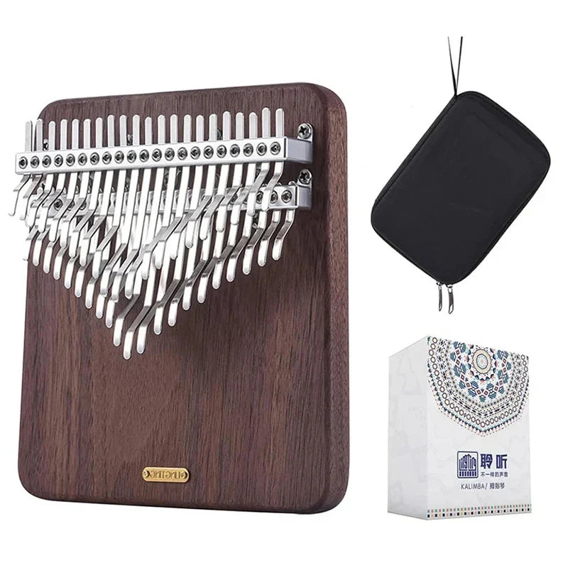 Dark wood lingting chromatic kalimba with silver metal tines and gold logo plaque professional keyboard kalimba