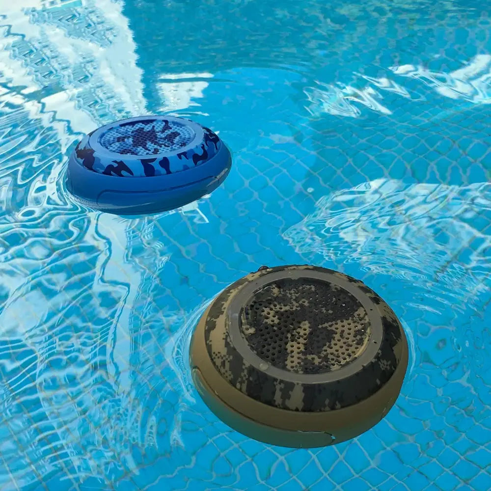 Blue and black camouflage cyboris t101 portable wireless ipx7 waterproof floating speaker with perforated top surface