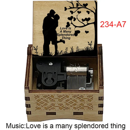A light wood music box with laser-engraved lid showing a famous movie melody for fans girlfriend couple lovers