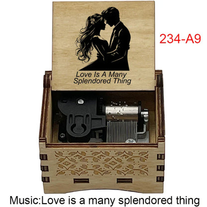 Light-colored wooden music box with laser-engraved couple silhouette and love is a many splendored thing for fans girlfriend couple