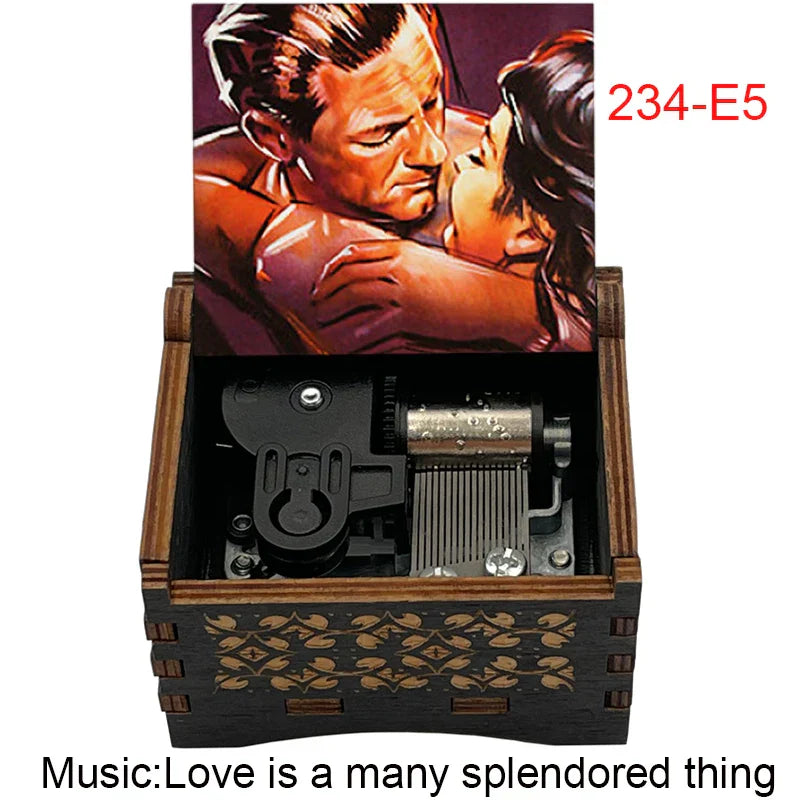 Dark wood music box with gold leaf patterns and an embracing couple illustration plays famous movie melody for fans girlfriend couple