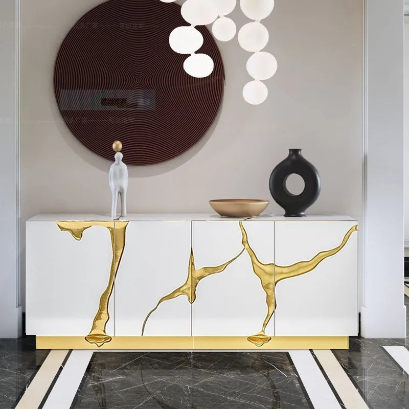 White sideboard cabinet with gold accent high-gloss marble-like streaks and matching gold base for luxury living room use