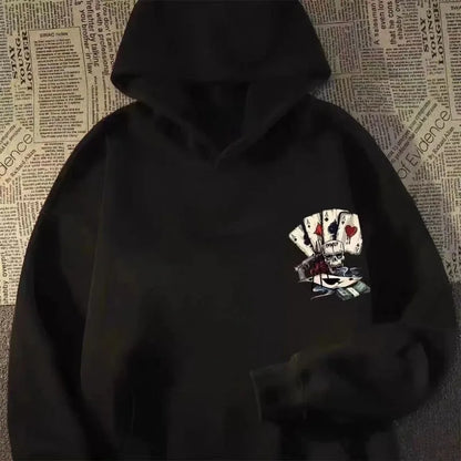 Black men pullover hoodie featuring skeleton poker print and oversized sweatshirt fashion design for autumn wear