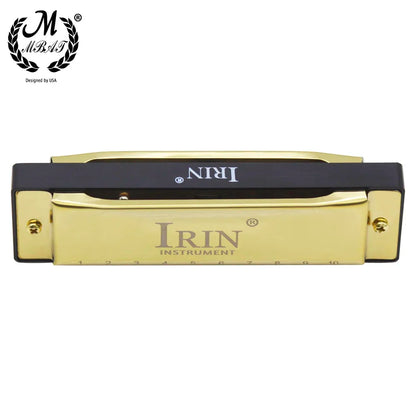 Gold-colored m mbat blues harmonica with black top plate and engraved brand markings in abs box for beginners