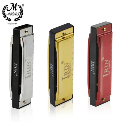 Three irin blues harmonicas with metallic silver gold and red bodies black ends brass screws in an abs box case