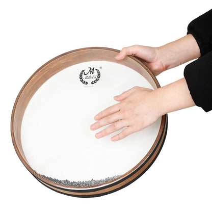 A wooden-framed 16 to 22 inch tambourine waves hand drum with white surface and silver beads for waves sound ocean